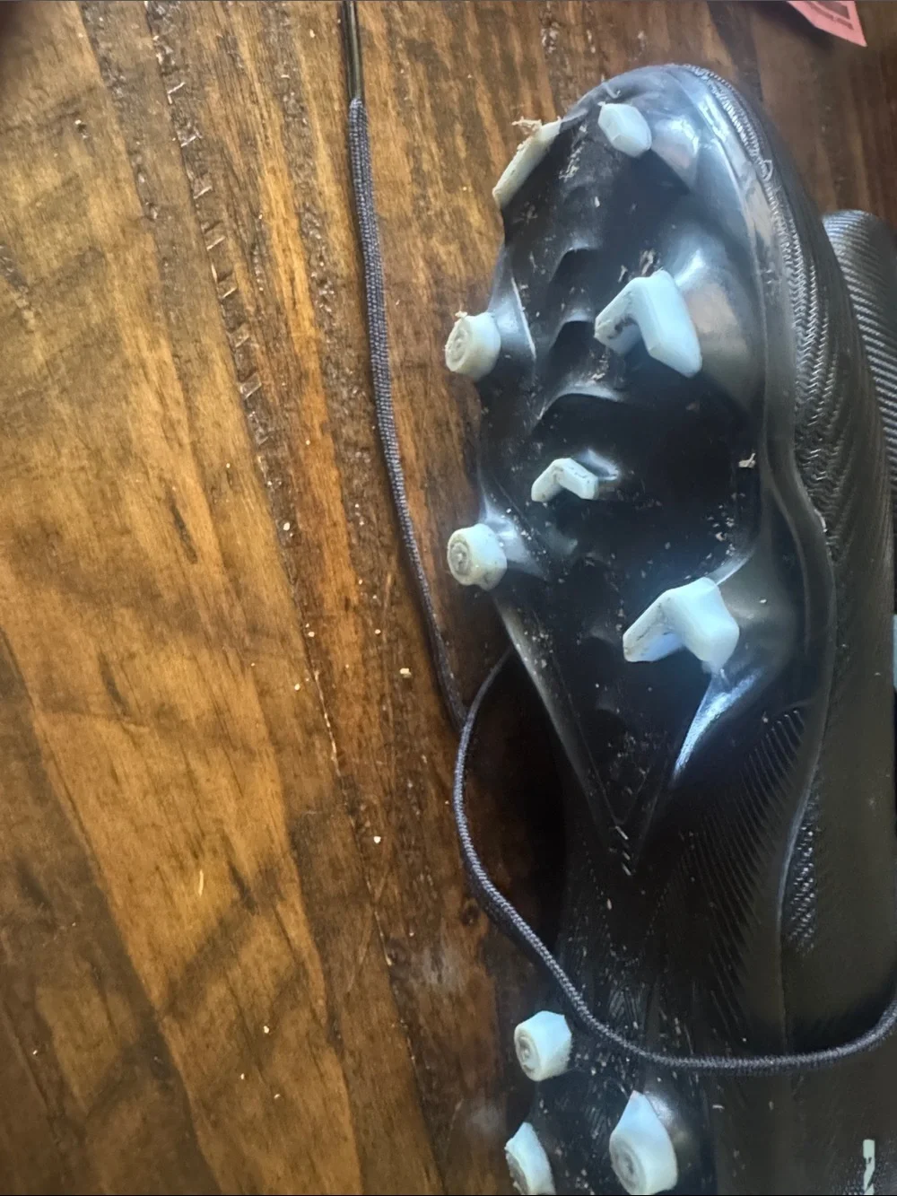 Nike Black Cleats with Light Blue Swoosh
